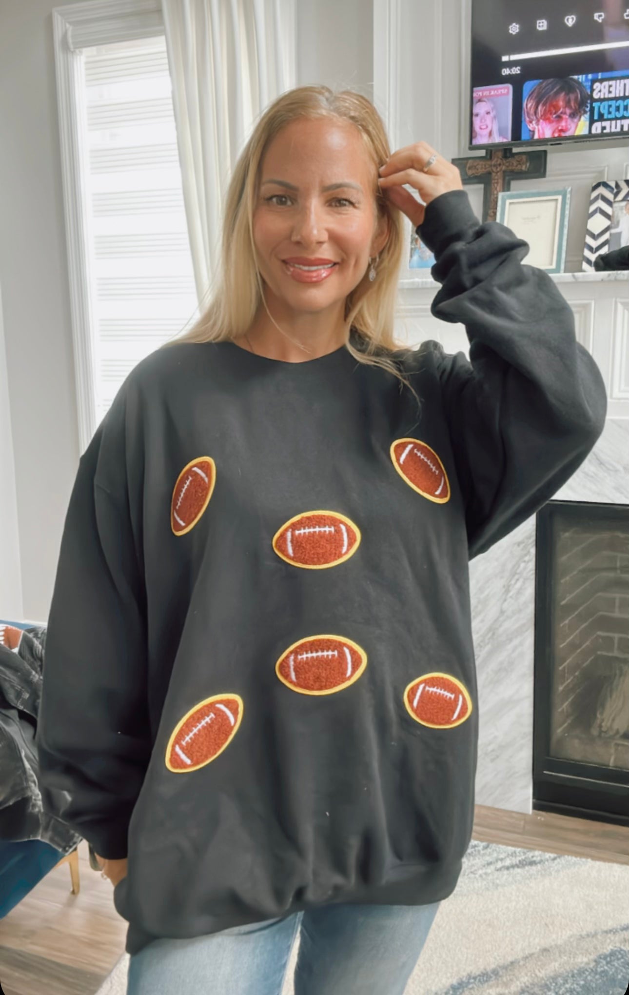 Sweatshirt with football patches