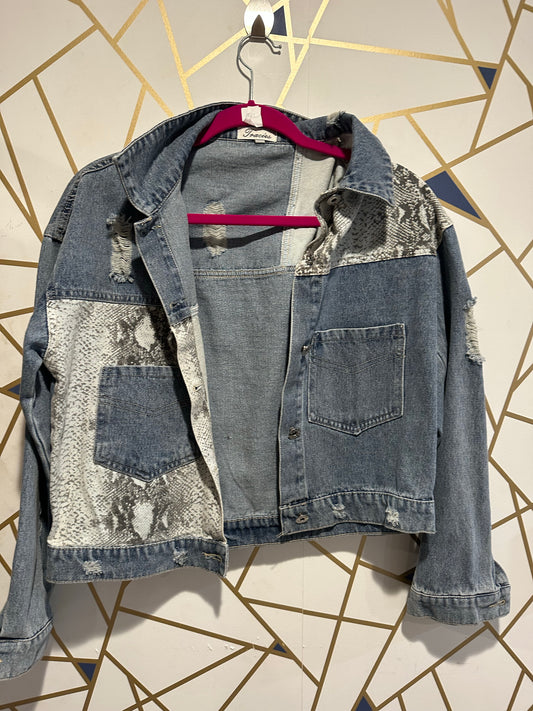 Denim jacket with snake skin patchwork