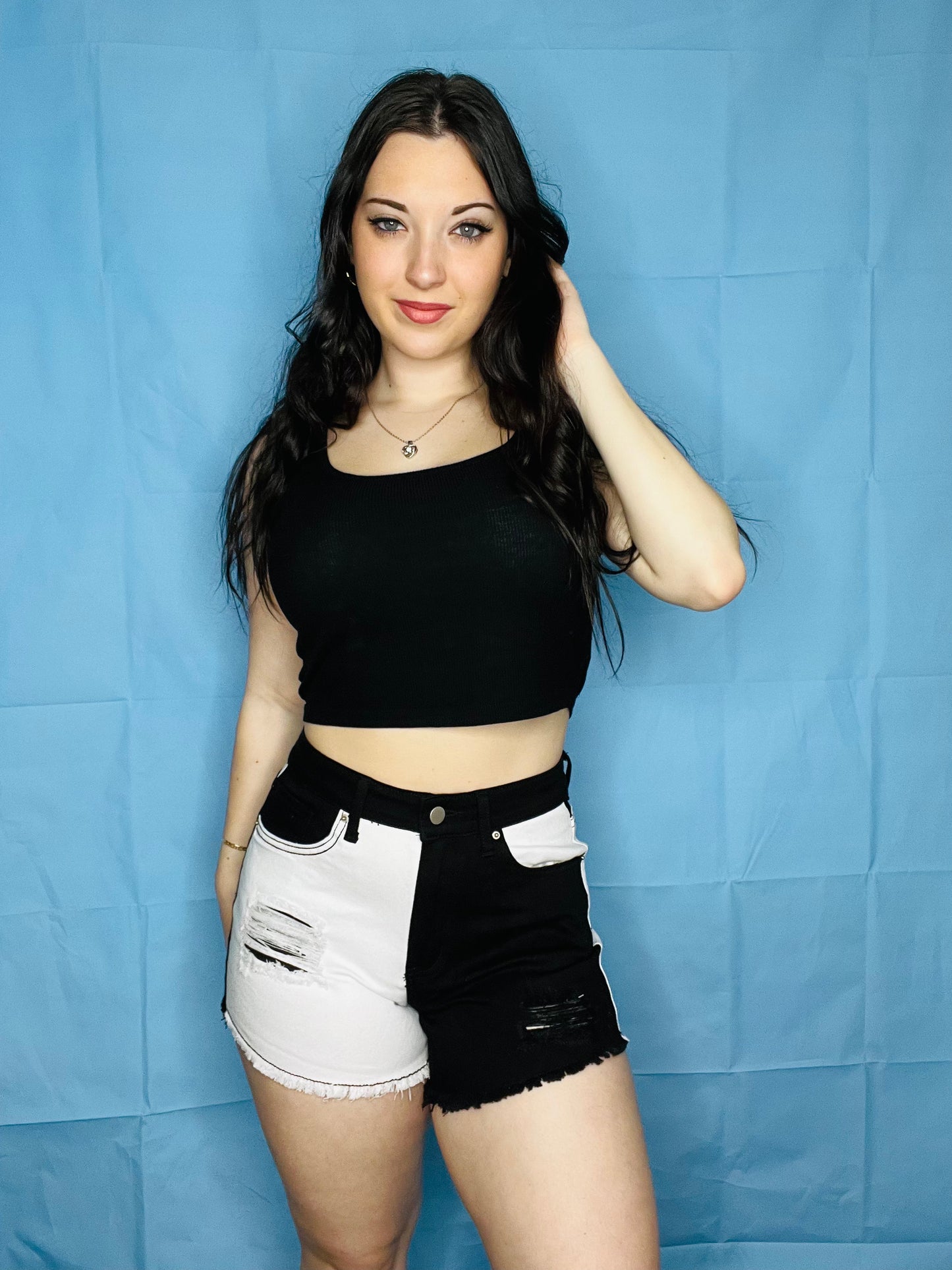 Black and White ripped shorts